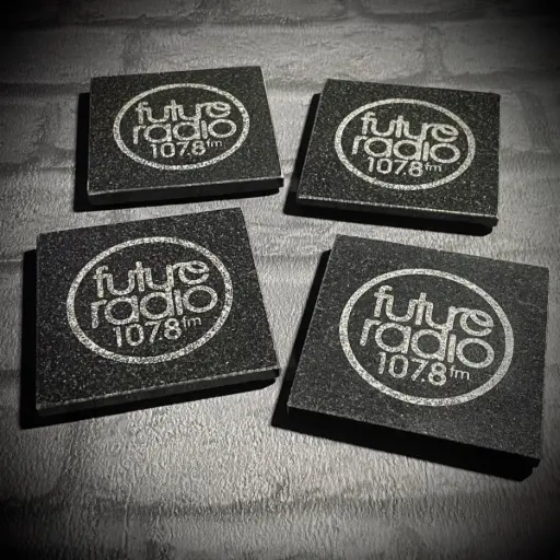 Bespoke laser engraved granite coasters created for Future Radio Norwich.